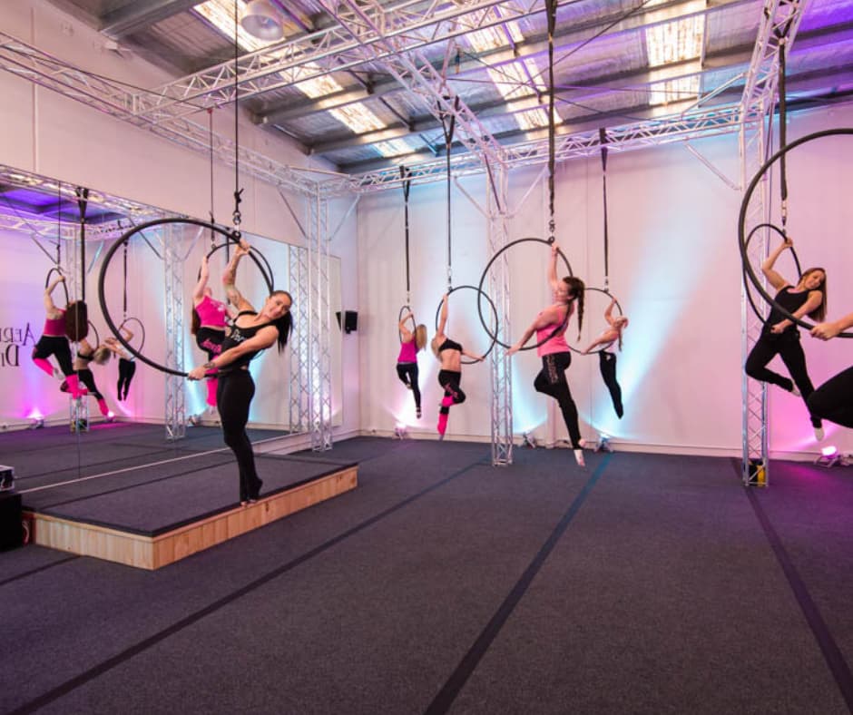 group of women doing aerial hoop